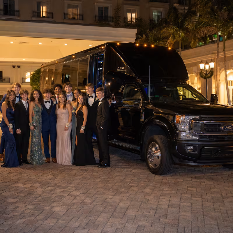 Party bus interior with wraparound leather seating and LED lighting in San Diego