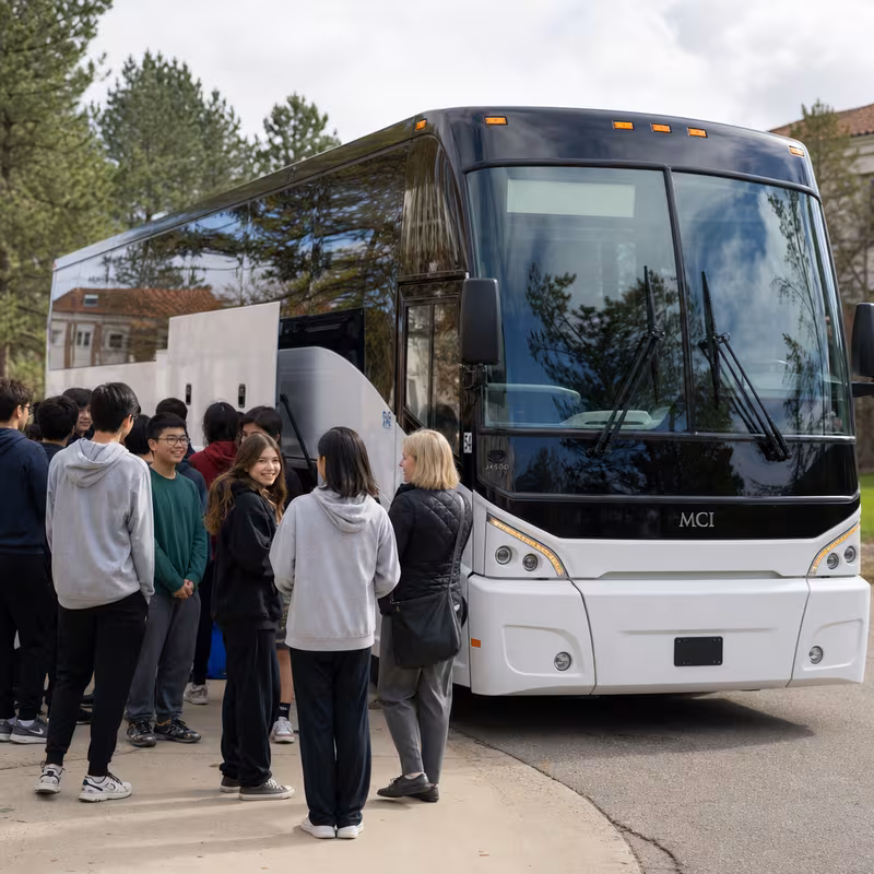 Black Mercedes Sprinter van staged for an San Diego School Transportation group