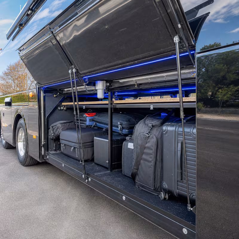 Party bus interior with wraparound leather seating and LED lighting in San Diego