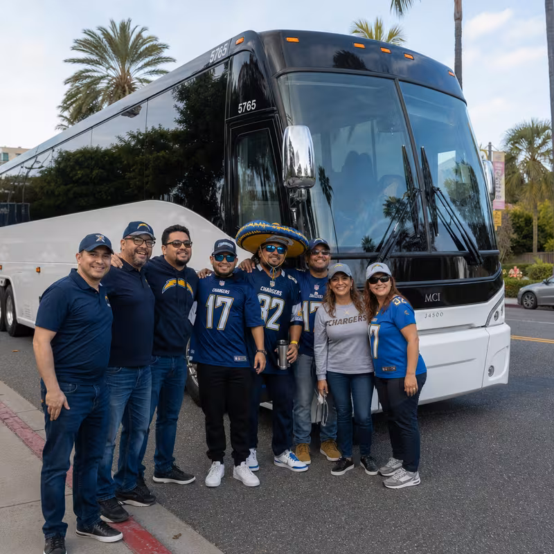 Passengers loading luggage while boarding an San Diego group shuttle